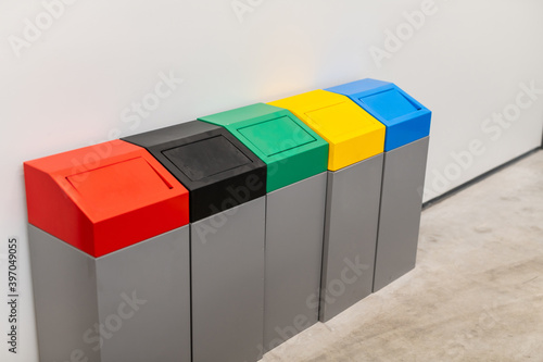 Obraz na płótnie waste segregation in the production plant - industry - color-coded garbage can w salonie
