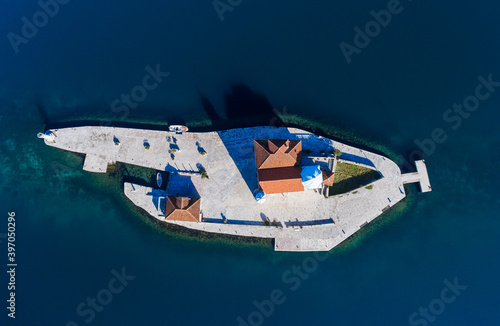 Top view of Our Lady of the Rocks island. Artificial island in Bay of Kotor, Montenegro photo