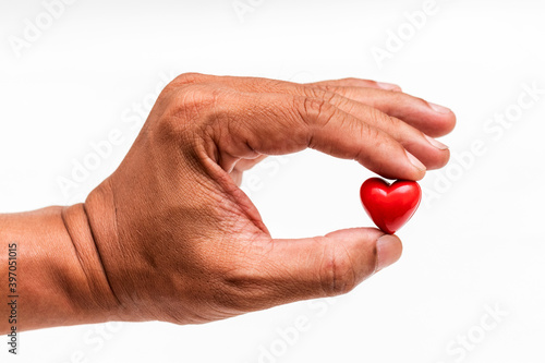 Little Heart in hand of old man. heart disease, Heart Disease Prevention, Health care 