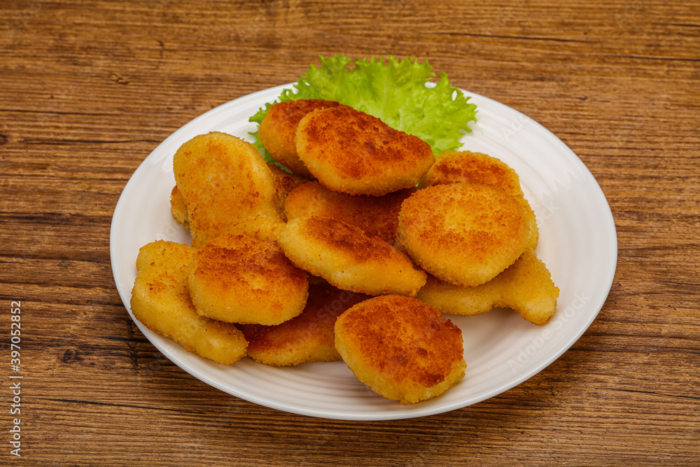 Fried chicken nuggets served salad leaves Fried chicken nuggets served salad leaves