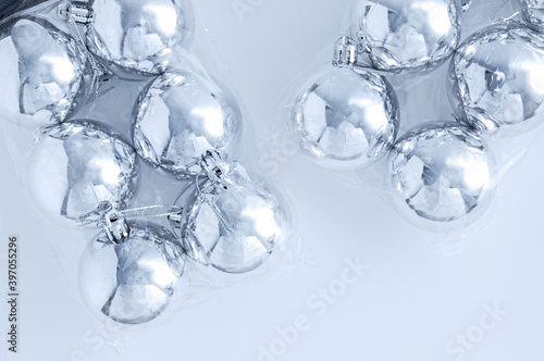 Wallpaper Mural Christmas silver balls in two transparent packaging on white background. Torontodigital.ca