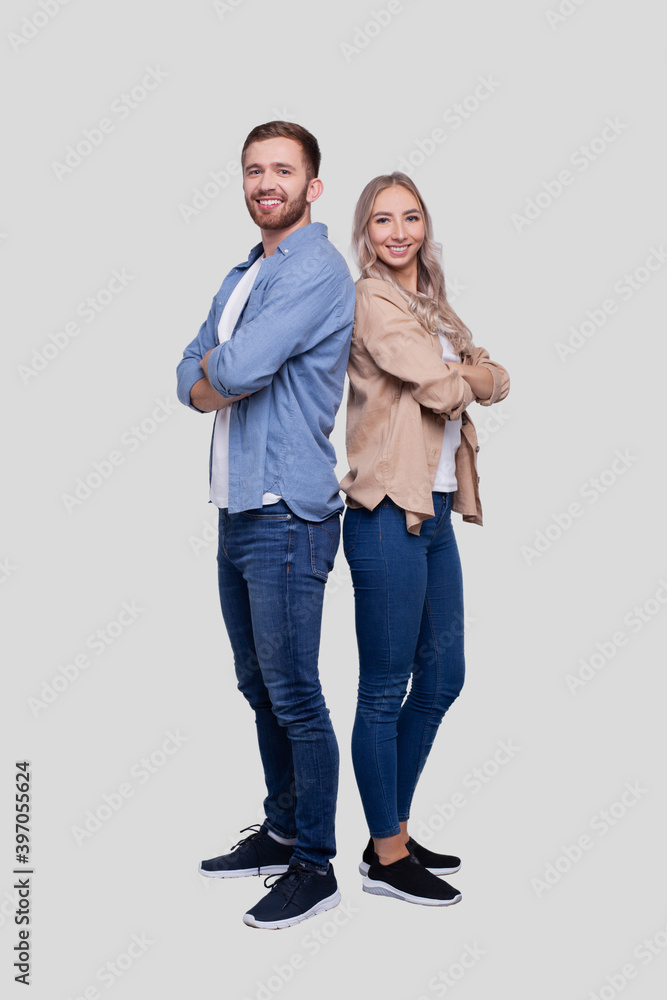 Couple Standing Back to Back Smilling Isolated. Man and Woman Hugging, Lovers, Friends, Couple Concept Couple Standing Back to Back Smilling Isolated. Man and Woman Hugging, Lovers, Friends, Couple Concept