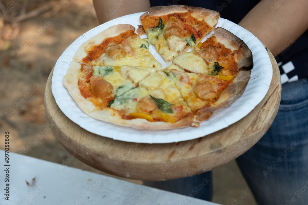Homemade classic italian pizza. Chef makes homemade pizza on the holidays. Homemade classic italian pizza. Chef makes homemade pizza on the holidays.