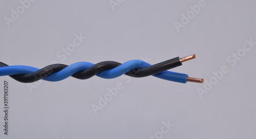closeup pure copper power cable on a white background.