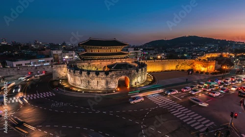 Time lapse Traffic at Janganmun Gate at Hwaseong Fortress Twilight in Suwon South Korea, photo