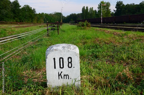 View of a railway station with a kilometer indicator, Miroslav, Czech Republic. Old security device. photo