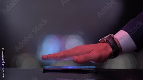 Hand over Phone Reveals Hologram Word COST
