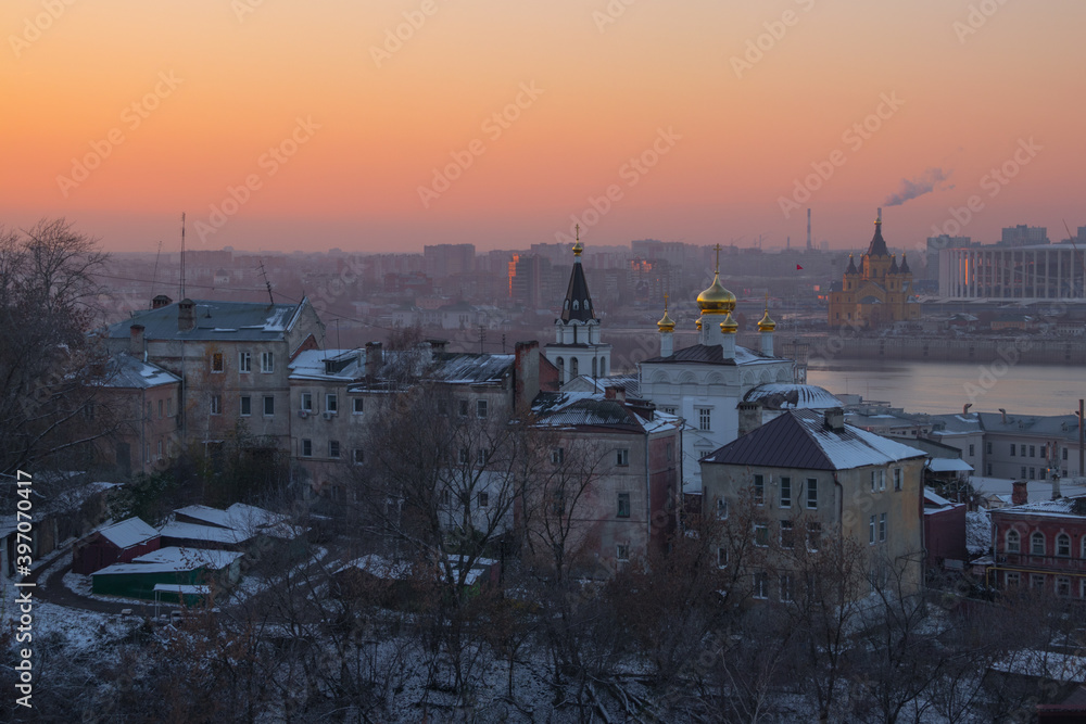 The late fall cold city at sunset. Nizhny Novgorod, Russia. River Oka.