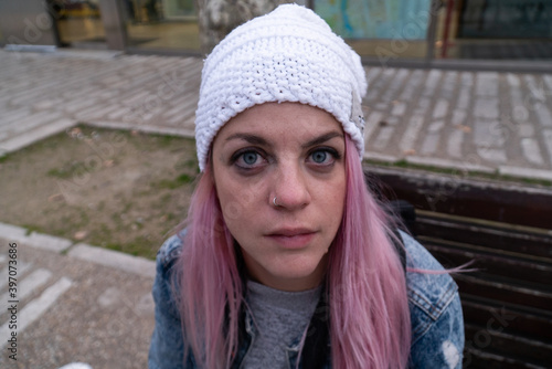 portrait of a woman with pink hair