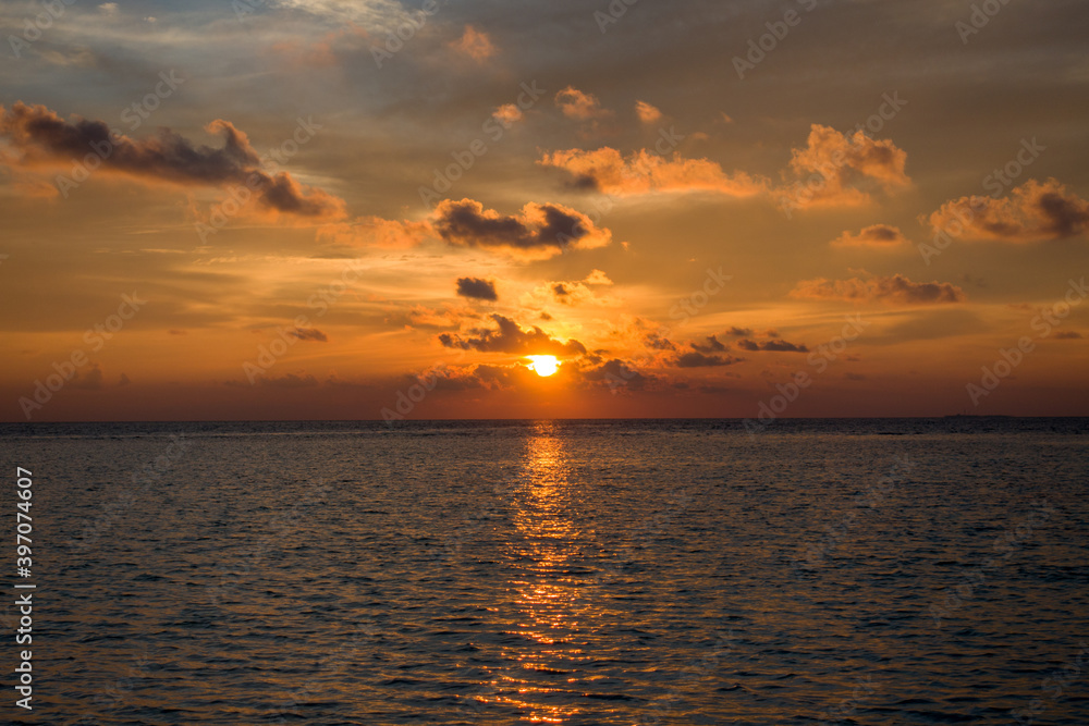 Sunset on the Maldives with clouds