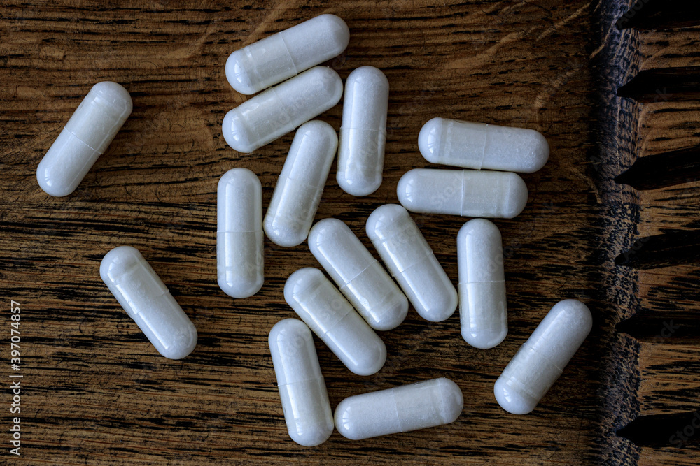 close-up of acetyl l-carnitine pills. dietary concept. dietary supplement topview. close-up of acetyl l-carnitine pills. dietary concept. dietary supplement topview.