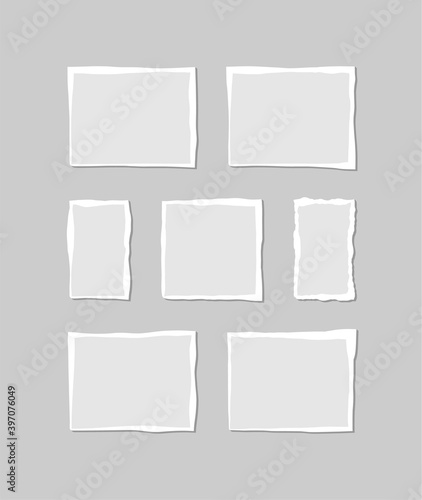 Set of torn white note. Scraps of torn paper of various shapes isolated on gray background. Vector illustration.