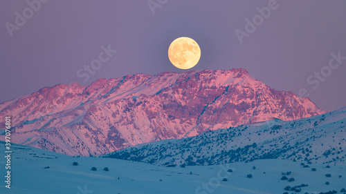 Konstfotografi Fantastic orange evening mountain landscape glowing by sunlight