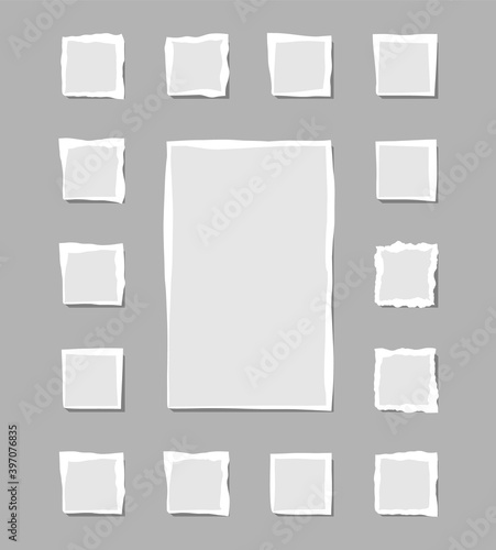 Set of torn white note. Scraps of torn paper of various shapes isolated on gray background. Vector illustration.