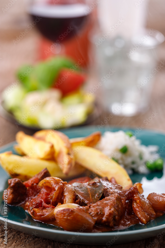 greek stifado meat stew with fries greek stifado meat stew with fries