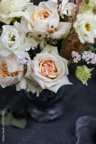 Flower arrangement in English style on a table.