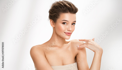 Beautiful woman with perfect makeup on white background. Beauty and skin care concept