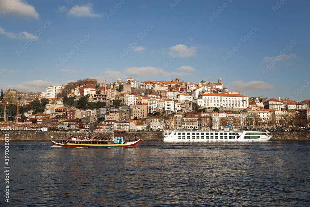 Porto Portugal Douru river view from the other side  sunny day blue sky with white clouds