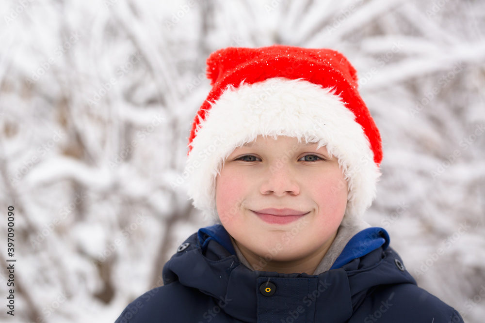 boy wearing a Santa hat boy wearing a Santa hat