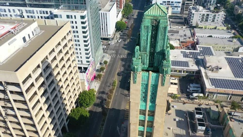 Good aerial of the Bullocks Wilshire Art Deco historical building and copper summit in Los Angeles, California. photo