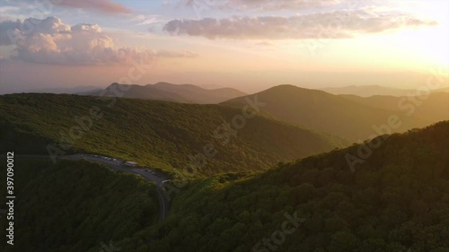 Aerial over the Blue Ridge Mountains at sunset near Asheville, North Carolina.