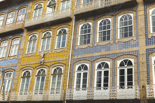 facade of a building in Portugal Guimarães ajulejos colorful blue yellow  windows 