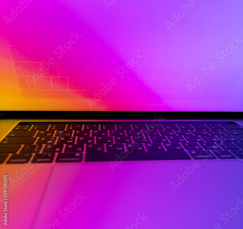 Inside MacBook illuminated with gradient view from edge