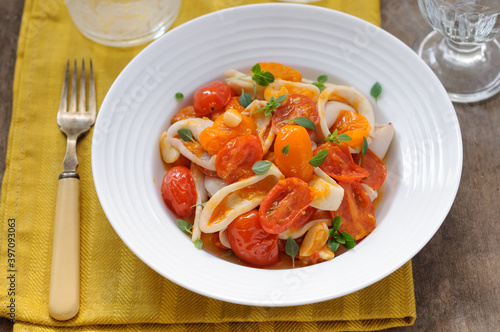 Sauteed Squid with Cherry Tomatoes, Garlic and Basil Leaves