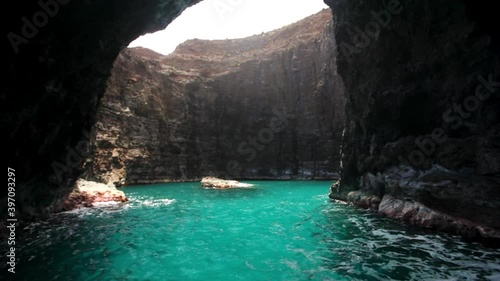Wide, water flows through secret cave in Kauai