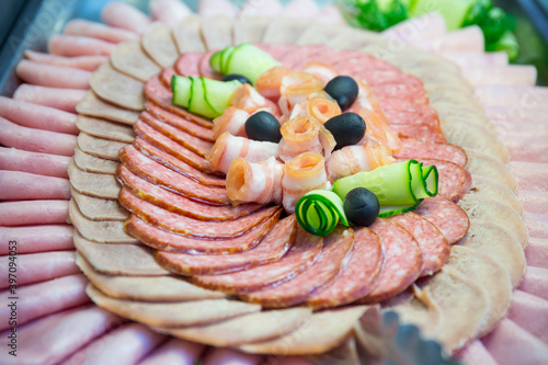 Cliced meat and ham ready to be served photo