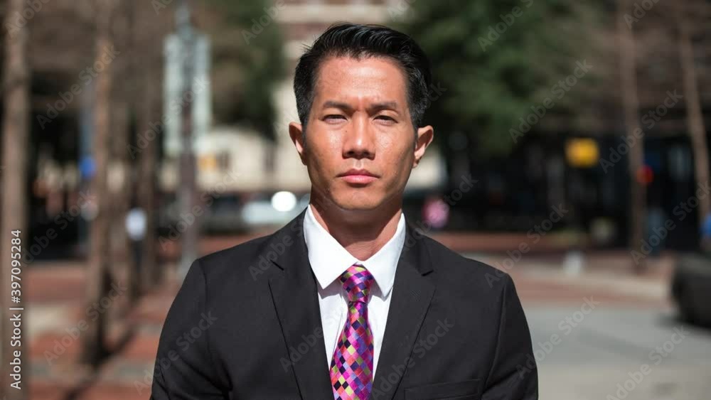 Time lapse of businessman standing on city street Time lapse of businessman standing on city street