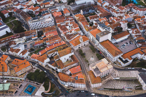 drone shot aerial view from above look Aveiro Portugal cloudy day city center rooftops orange red 