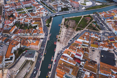 drone shot aerial view from above look Aveiro Portugal cloudy day city center rooftops orange red 