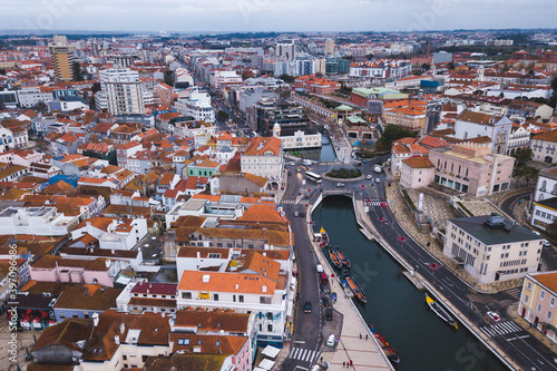 drone shot aerial view from above look Aveiro Portugal cloudy day city center rooftops orange red 