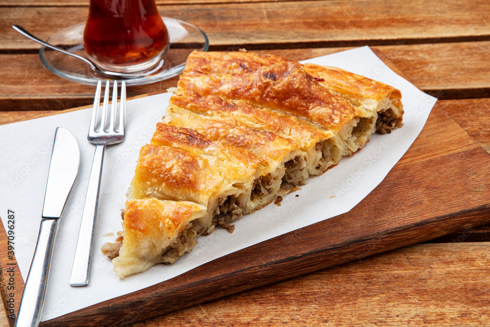 Turkish Tepsi Boregi, Round Borek, Tray pastry (Turkish name; rulo borek - sigara boregi) Turkish Tepsi Boregi, Round Borek, Tray pastry (Turkish name; rulo borek - sigara boregi)