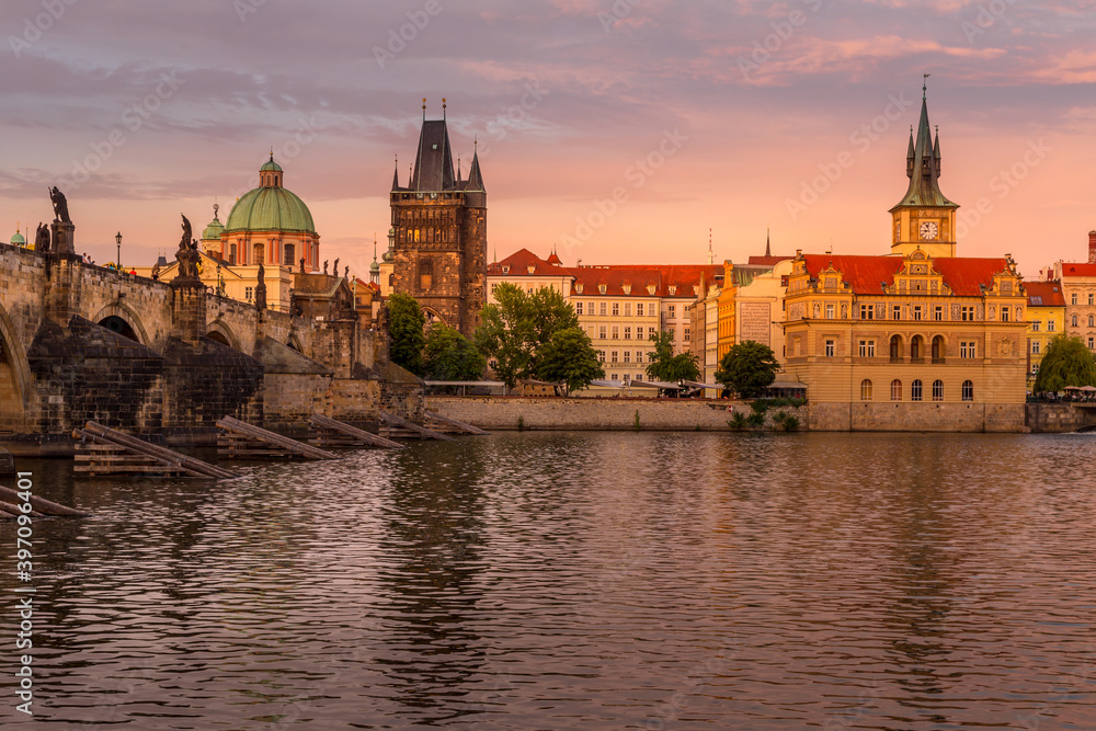 Panorama of old Prague. Panoramic view of picturesque Prague Charles Bridge and Old Town Towers on sunset. Prague, Czech Republic