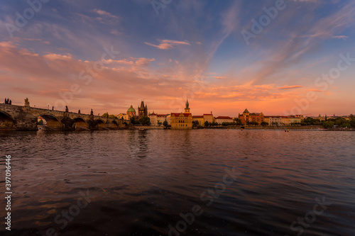 Panorama of old Prague. Panoramic view of picturesque Prague Charles Bridge and Old Town Towers on sunset. Prague, Czech Republic