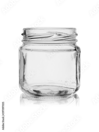 Glass jar with reflection without lid, isolated on a white background