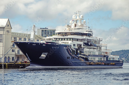 Huge modern yacht moored in the port of Bergen, Norway