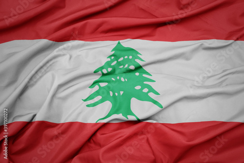 waving colorful national flag of lebanon. photo