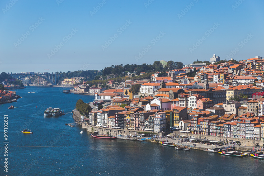Porto Portugal Douru river coast day sunlight sunshine blue sky boats