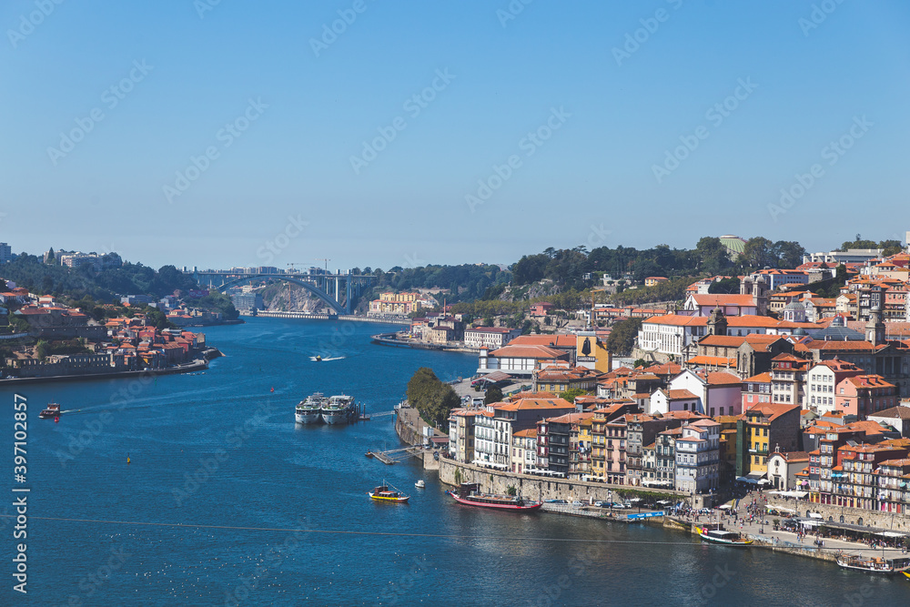 Porto Portugal Douru river coast day sunlight sunshine blue sky boats