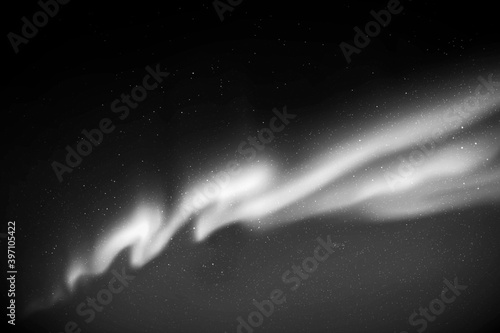 Starry sky. Northern lights, aurora borealis. Black white background