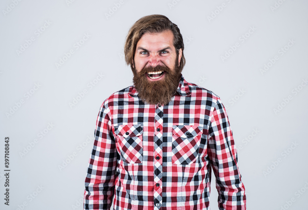angry handsome bearded guy with unshaven face and stylish hairdo wear casual clothes, anger angry handsome bearded guy with unshaven face and stylish hairdo wear casual clothes, anger