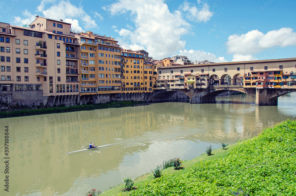 Canoeing on the river in Florence, Italy