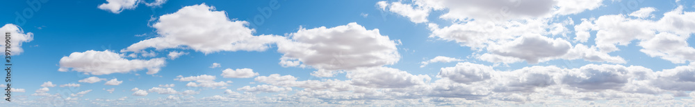 Obraz premium Blue Sky with Puffy White Clouds Panorama Background-2