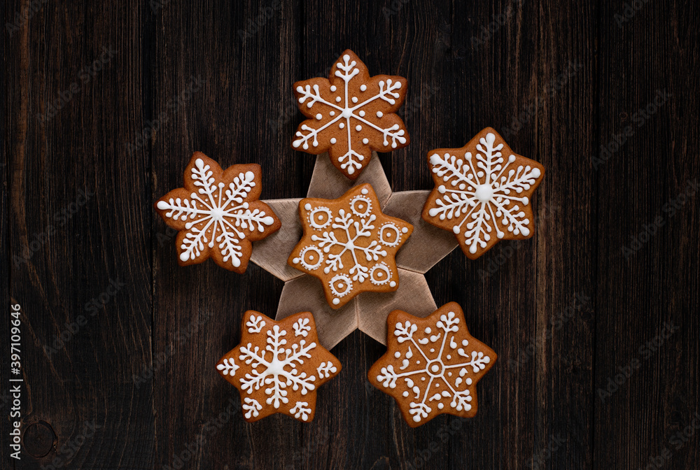 Various christmas gingerbread stars on wooden background Various christmas gingerbread stars on wooden background
