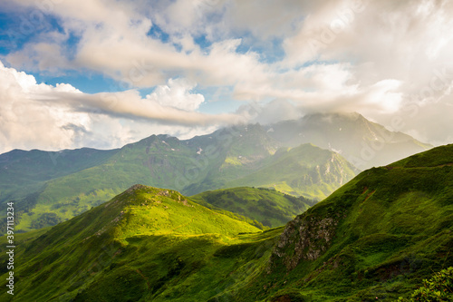 Beautiful mountain landscape at Caucasus mountains with clouds and cloudy sky
