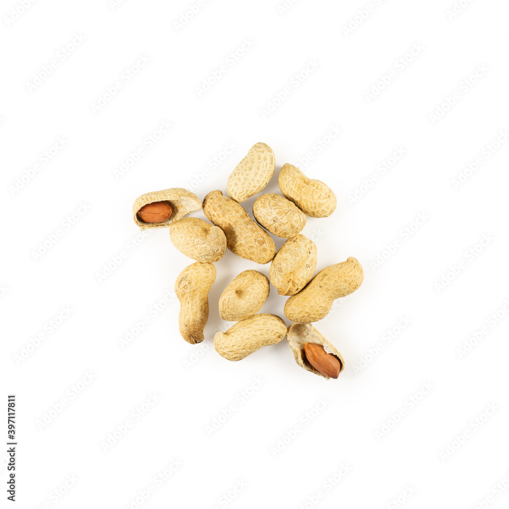 A handful of peanuts on a white background A handful of peanuts on a white background
