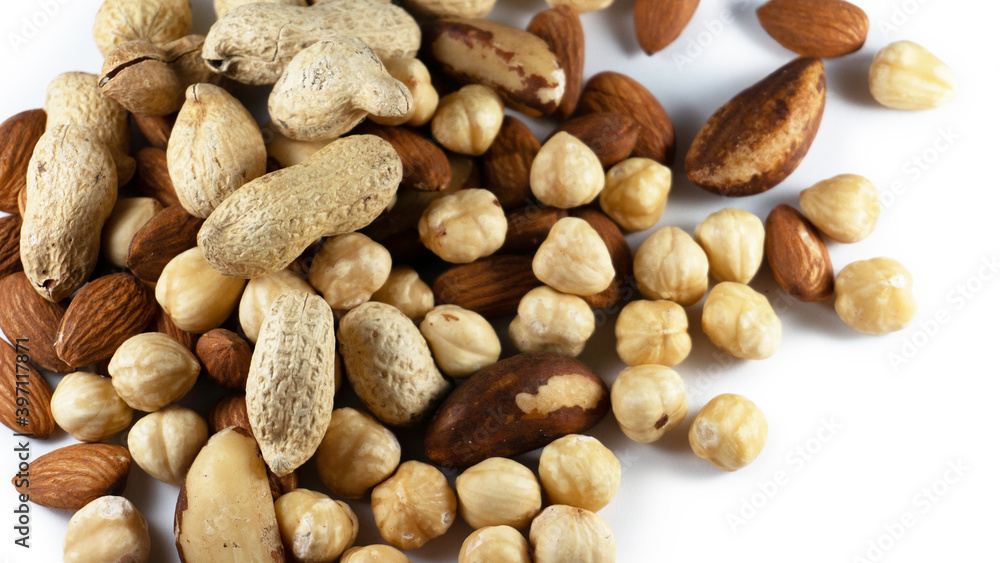 A handful of nuts on a white background A handful of nuts on a white background